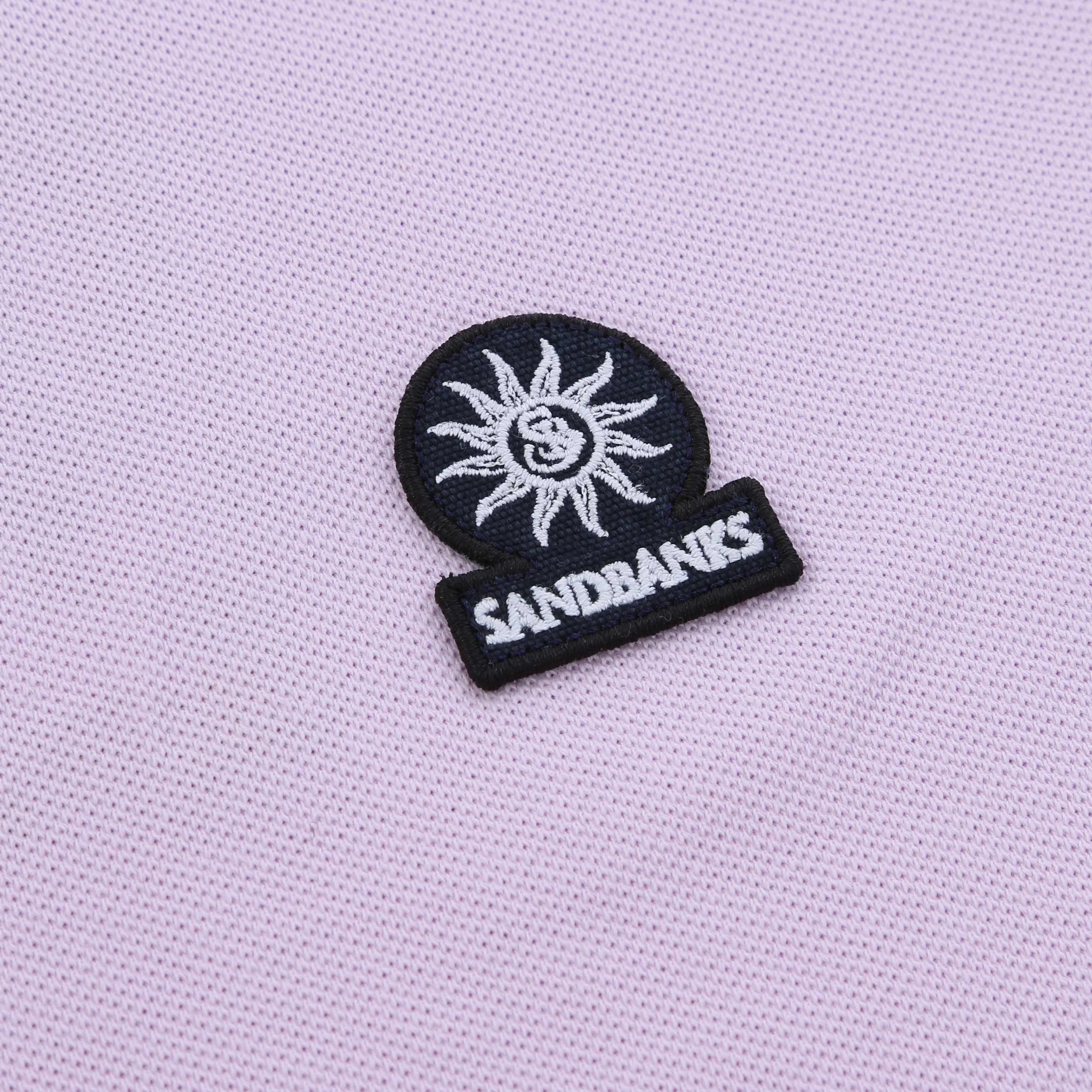 Sandbanks Badge Logo Polo Shirt in Lilac